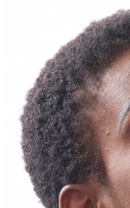 A right front view of 4C super curly natural hair.